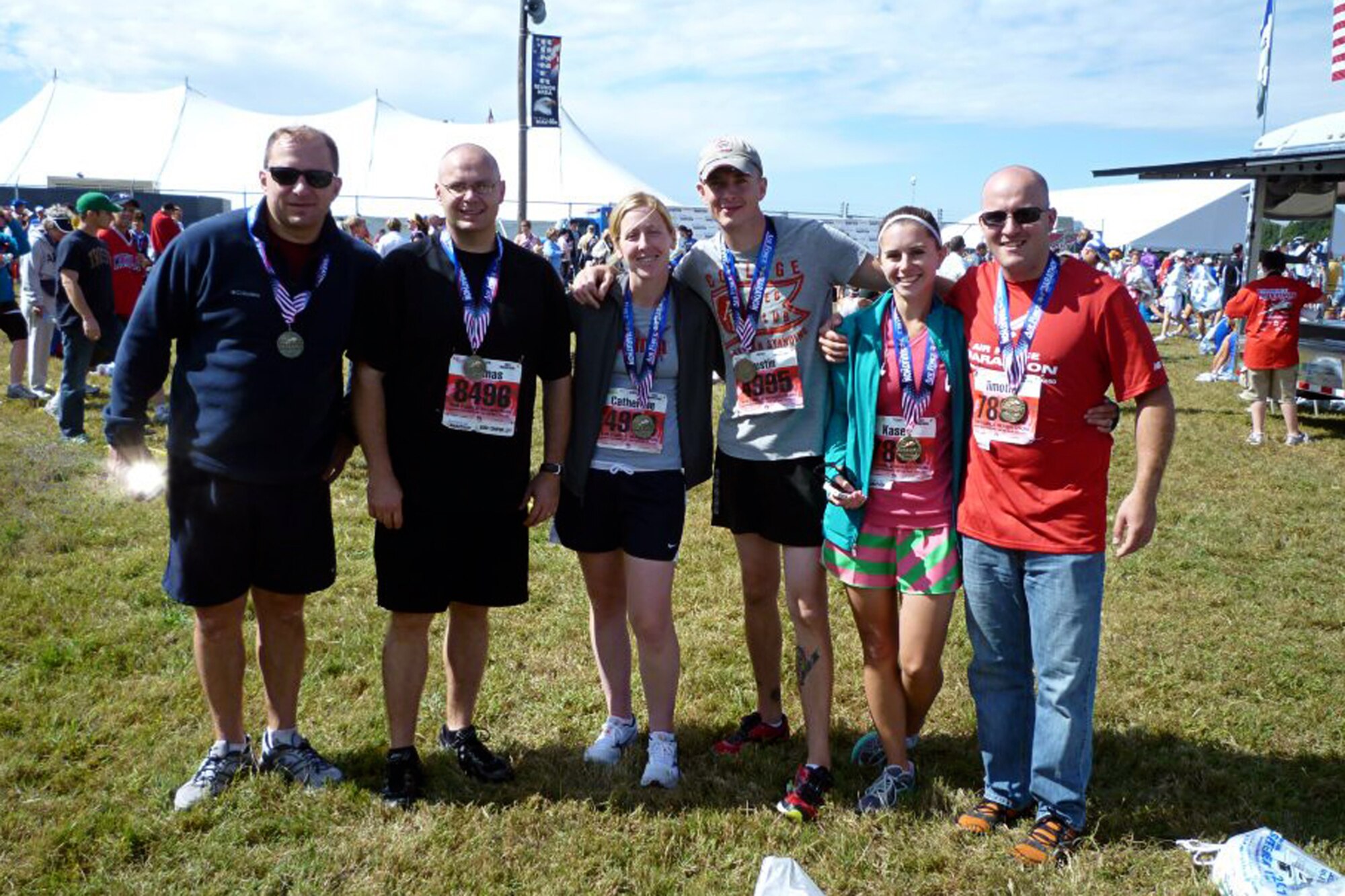GRISSOM AIR RESERVE BASE, Ind. -- Nathan Salvagni snapped this photo of his 434th Security Forces Squadron teammates after they finished running in the 15th Annual Air Force Marathon held at Wright-Patterson Air Force Base, Ohio, Sept. 17. Not only did the 434th SFS participate, but so did several Grissom Airmen from different base agencies. Pictured from left to right are James Benvenuto, Thomas Siegel, Catherine Devine, Dustin Devine, Kasey Potts and Timothy Potts. (U.S. Air Force photo/Tech. Sgt. Nathan Salvagni) 
