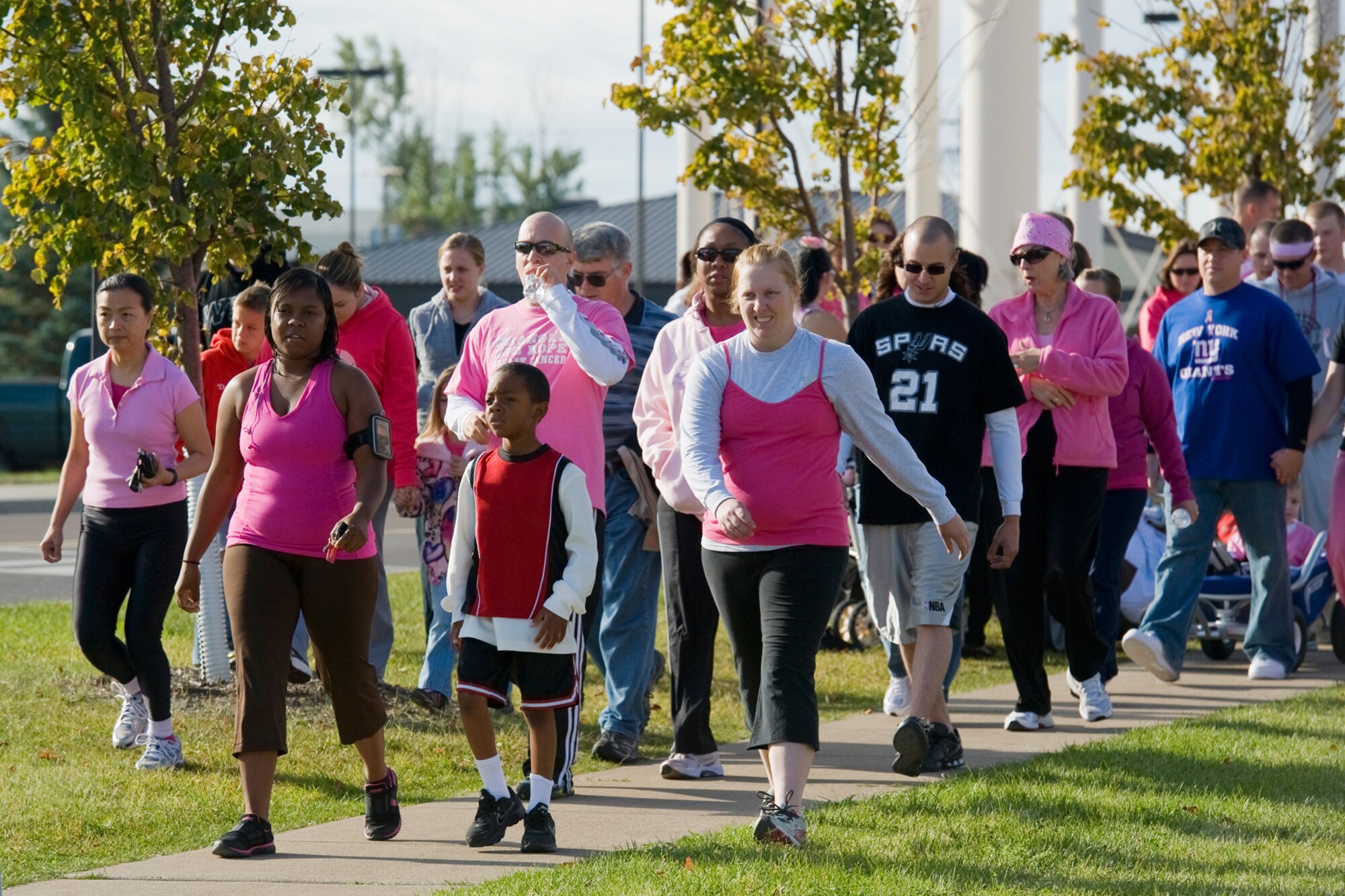 Members of Team Malmstrom wear pink during the 3-mile walk/run. (U.S. Air Force photo/Beau Wade)