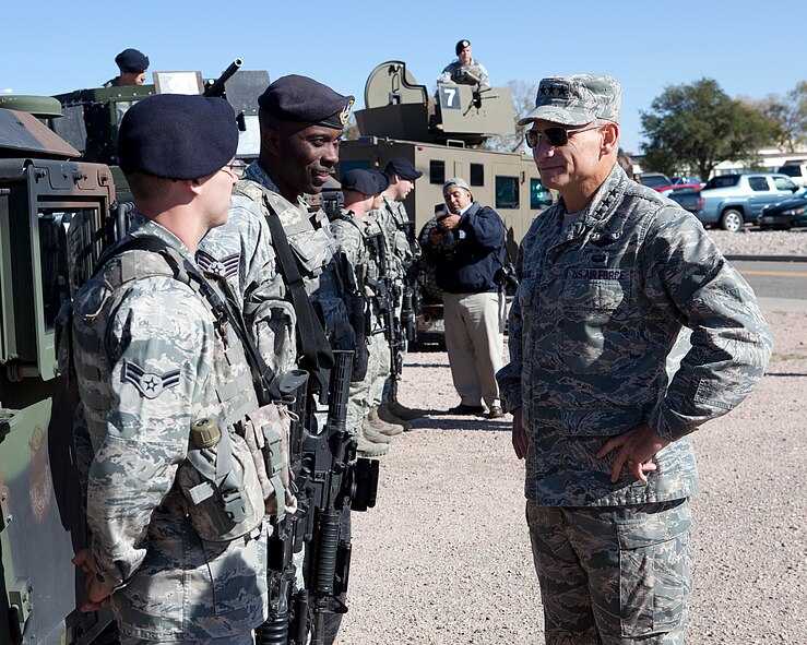 Lt. Gen. Jim Kowalski, Air Force Global Strike Command commander, speaks with Staff Sgt. Koeal Braxton, Airman 1st Class Kyle Hawn and Airman 1st Class Louie Cruz, all with the 790th Missile Security Forces Squadron, during the Air Force Chief of Staff Civic Leader Program’s tour Oct. 20. (U.S. Air Force photo by Matt Bilden)