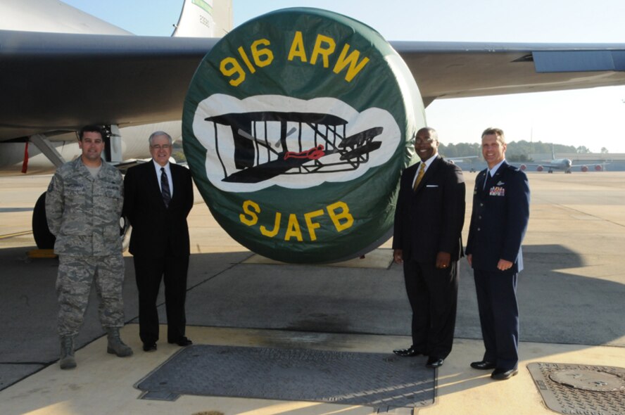 Master Sgt. Jamie Applequist, 916th Logistics Readiness Squadron, stands with Mark Twisdale and McKinley Wooten from the State Employees Credit Union, and Col. Randy Ogden, wing commander on Oct. 22, 2011. SECU won the 2011 Secretary of Defense Freedom Award for their continued support of their Guard and Reserve workforce. (USAF photo by TSgt. Scotty Sweatt, 916ARW/PA)