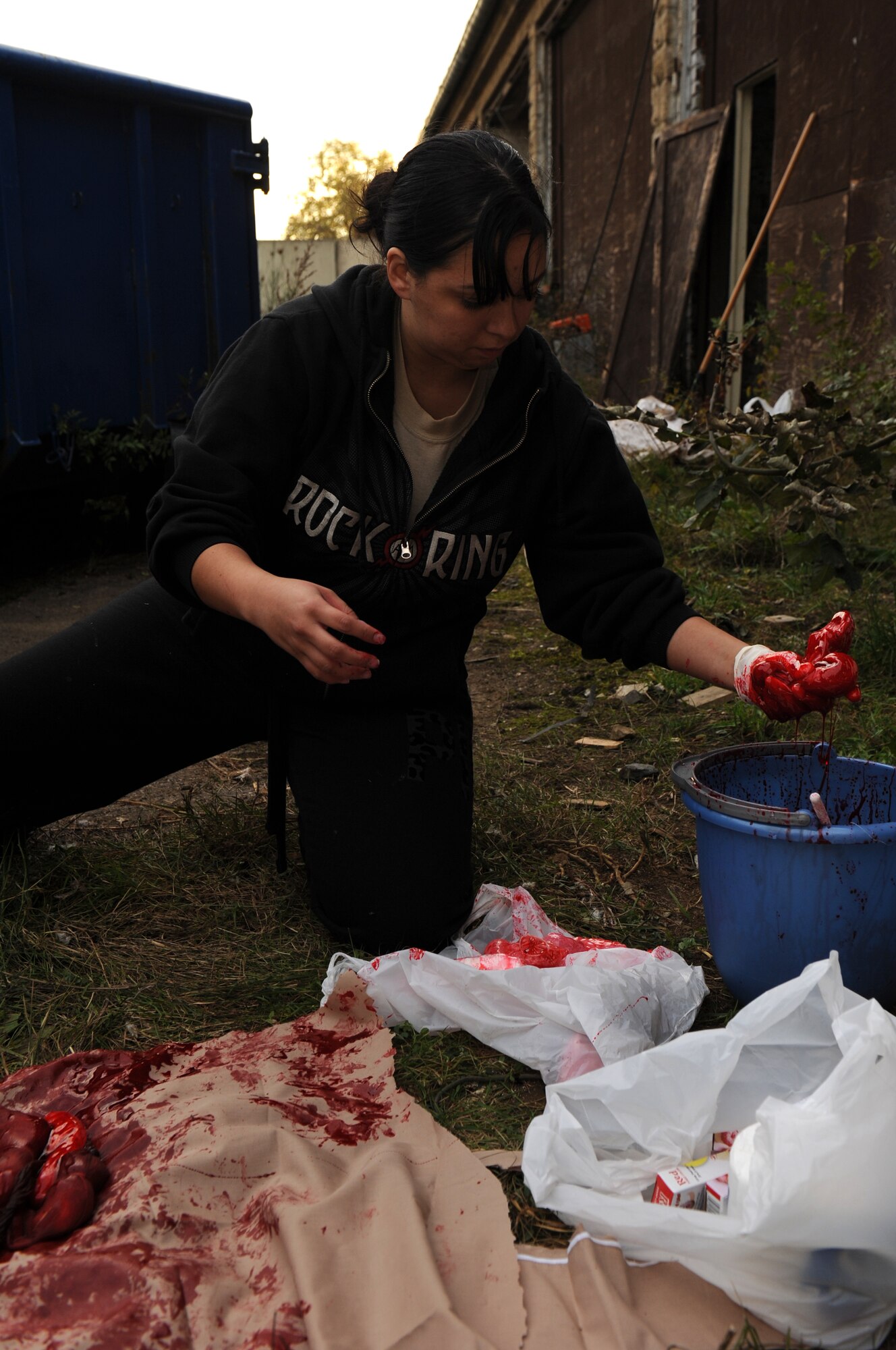 BITBURG ANNEX, Germany -- Airman 1st Class Evelyn Gutierrez, 52nd Medical Operations Squadron bio-environmental engineer technician, makes fake guts for a haunted house here Oct. 27. The haunted house is scheduled for Oct. 27-29 in Bldg. 2032 and 2033 at the French Casern on Bitburg Annex. Admission is $5 for adults and $3 for children younger than 13. The doors open at 5 p.m. every night. The first hour of the night is for younger children who just want to trick-or-treat. (U.S. Air Force photo/Airman 1st Class Brittney Frees)