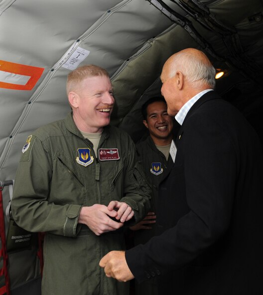 ROYAL AIR FORCE MILDENHALL, England – Chief Master Sgt. Steven Flax, 100th Operations Group chief enlisted manager, Senior Airman Kenneth Arcibal, 351st Air Refueling Squadron, and John Cushing, 100th Maintenance Group honorary commander, talk aboard a KC-135 Stratotanker, during Honorary Commander’s Day here Oct. 27, 2011. The day was held to foster and maintain healthy British-American relationships between base commanders and their honorary commanders. (U.S. Air Force photo/Senior Airman Rachel Waller)