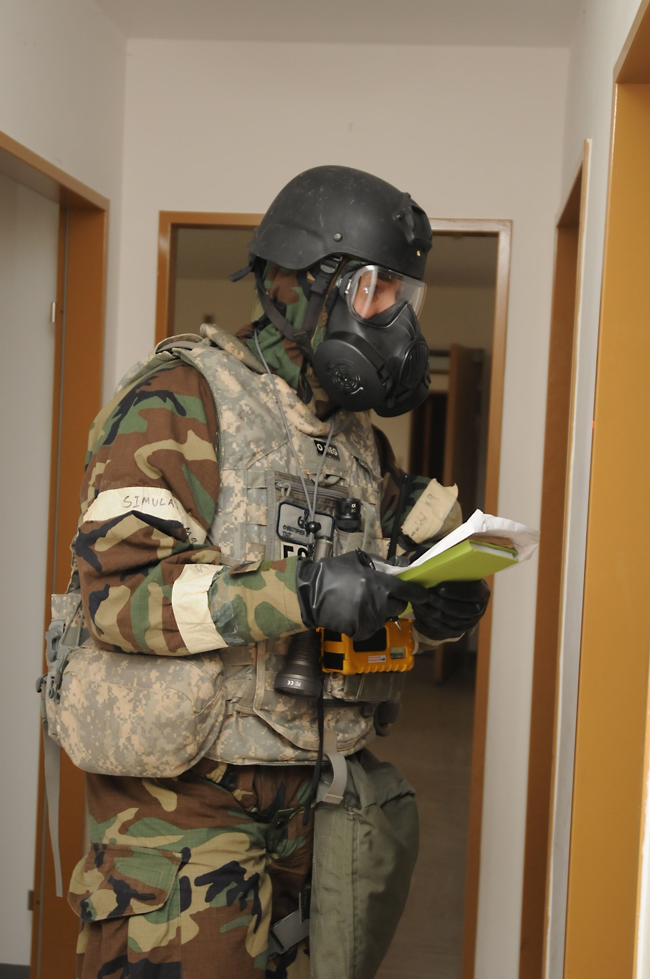 Air Force Tech. Sgt. Christopher Ramakka, 886th Explosive Ordnance Disposal Flight, conducts a room sweep during a joint exercise, Ramstein Air Base, Germany, Oct. 27, 2011. The exercise, designed to educate and train U.S. Air Force and Army servicemembers from six emergency response agencies, provided the skills needed for a real world response. (U.S. Air Force photo by Airman 1st Class Kendra Alba)