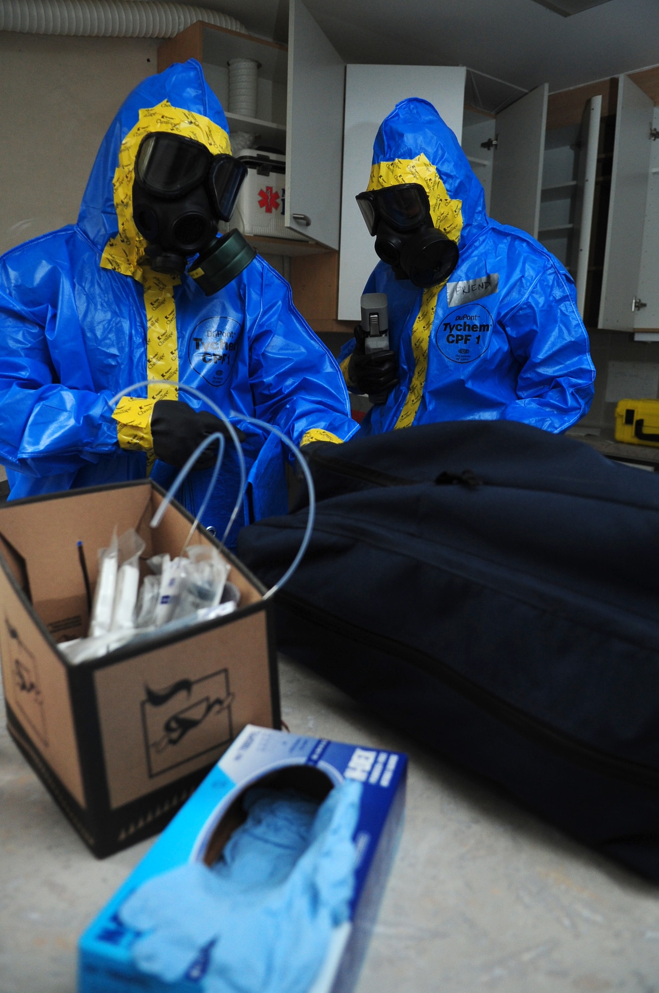 U.S. Air Force and Army servicemembers participate in a joint agency response exercise, Ramstein Air Base, Germany, Oct. 27, 2011. The exercise, designed to educate and train participants from six emergency response agencies, provided the skills needed for a real world response. (U.S. Air Force photo by Senior Airman Brittany Perry)