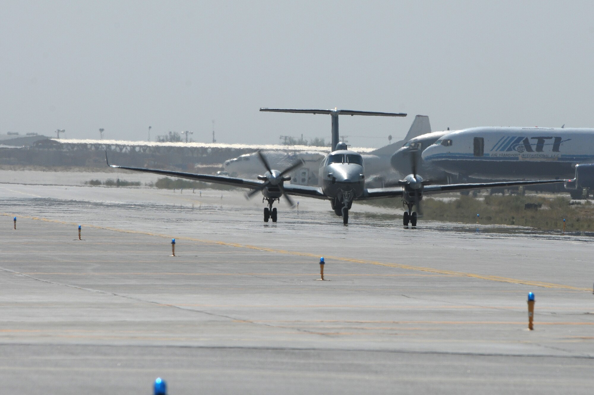 BAGRAM AIRFIELD, Afghanistan -- An MC-12 Liberty taxies out toward the runway here Oct. 19, 2011. The flight marked the 10,000th combat sortie flown in support of ground operations that have led to the capture or elimination of more than 4,000 targets. (U.S. Air Force photo/Senior Airman Krista Rose)