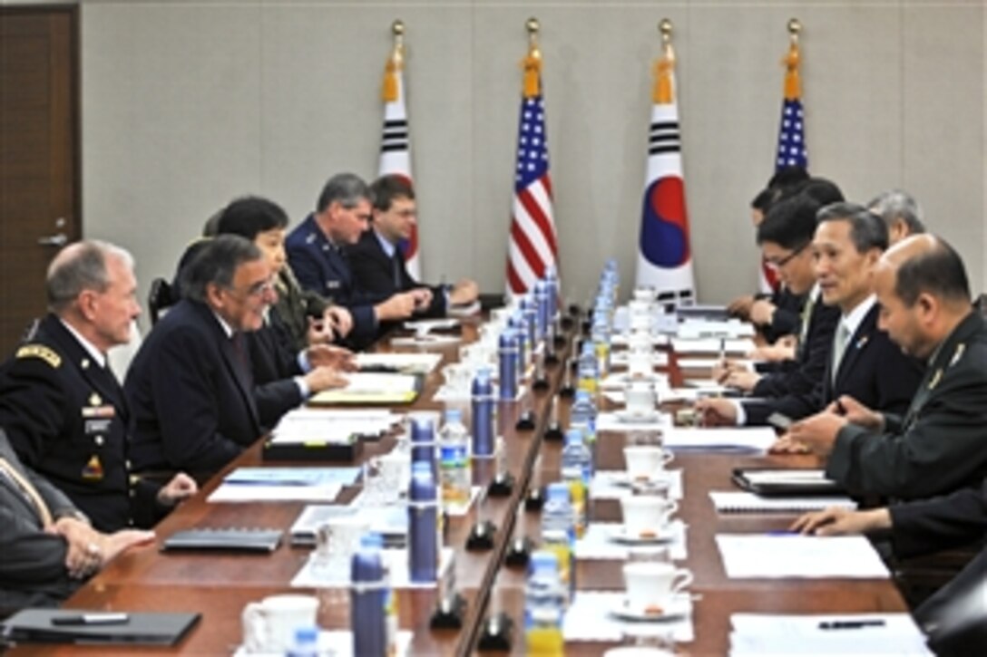 U.S. Defense Secretary Leon E. Panetta, second on left, and U.S. Army Gen. Martin E. Dempsey, chairman of the Joint Chiefs of Staff, attend a security consultative meeting with South Korean Defense Minister Kim Kwan-jin, second on right, in Seoul, South Korea, Oct. 28, 2011.