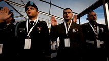 LIBERTY ISLAND, N.Y.  -- Lance Cpl. Tomas Roginski was one of a few Marines, sailors, airmen, Coast Guardsmen and soldiers to join a group of 125 immigrants in receiving their citizenship on Liberty Island, here, Oct. 28. The event was part of the day-long celebration of the 125th anniversary of the Statue of Liberty's dedication. The Department of Homeland Security rewards immigrants who join the military and serve honorably by exempting them from the normal residency requirements. Secretary of the Interior Ken Salazar told the new citizens, "You are represent what is best about America, because you represent what Americans should be celebrating and standing for around the world. We are a nation of diversity, and that diversity strengthens our country." Roginski immigrated to Brooklyn from Poland when he was a child. He currently serves in the Marine Corps with 6th Communication Battalion and is pursuing a degree in electrical engineering from the College of Staten Island. (Marine Corps production by Sgt. Randall. A. Clinton / RELEASED)