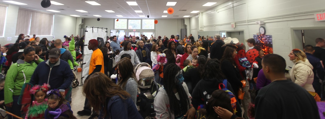 People gather in the Tarawa Terrace Community Center on military housing aboard Marine Corps Base Camp Lejeune on Oct. 29.It was the second Family Pumpkin Bash and attendance increased by a third.