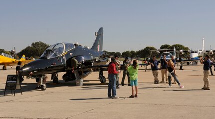 People attending the Randolph Air show take a close look at the British Aerospace Hawk, an aircraft flown by the Royal Air Force. (U.S. Air Force Photo by Don Lindsey)