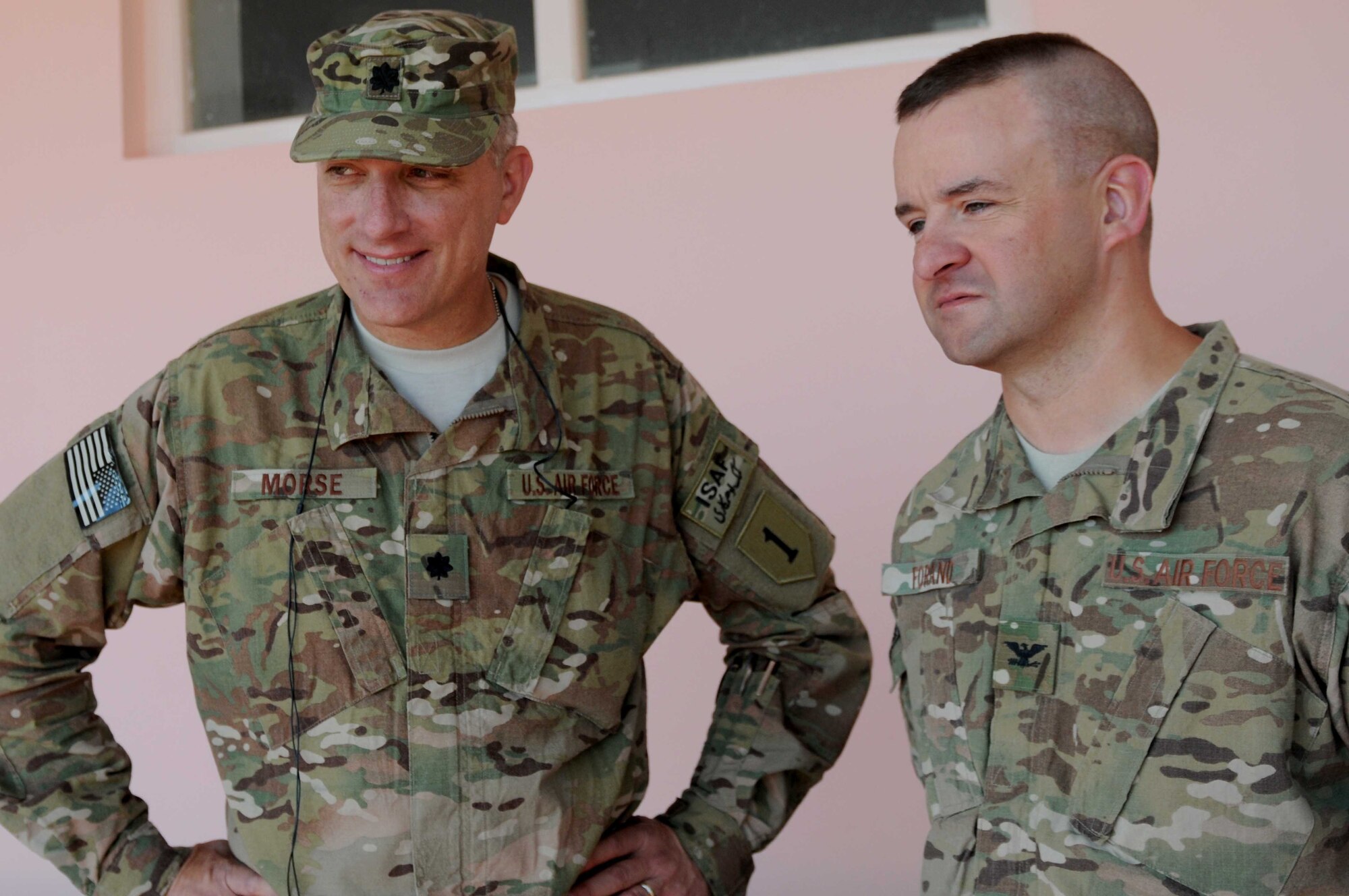 Lt. Col. John Morse (left) inbound Provincial Reconstruction Team Paktya commander from Tucson Ariz., discusses project openings with Col. James Forand, PRT Paktya commander from Auburn Mass., in Paktya Province, Afghanistan, Oct 19, 2011. Inbound PRT leaders received a glance of their upcoming deployment during a week-long PDSS of the PRT. (U.S. Air Force photo /1st Lt. Cammie Quinn)
