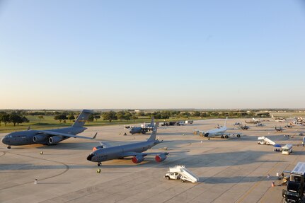 A birdseye view of the Randolph Air Force Base flightline Oct. 29 at the start of the 2011 Randolph Airshow. Air shows allow the Air Force to display the capabilities of their aircraft to the American public through aerial demonstrations and static displays.  Randolph's air show allows attendees to get up close and personal to see some of the equipment and aircraft used by the U.S. military servicemembers and DoD civilians today. (U.S. Air Force photo/Don Lindsey) (released)
