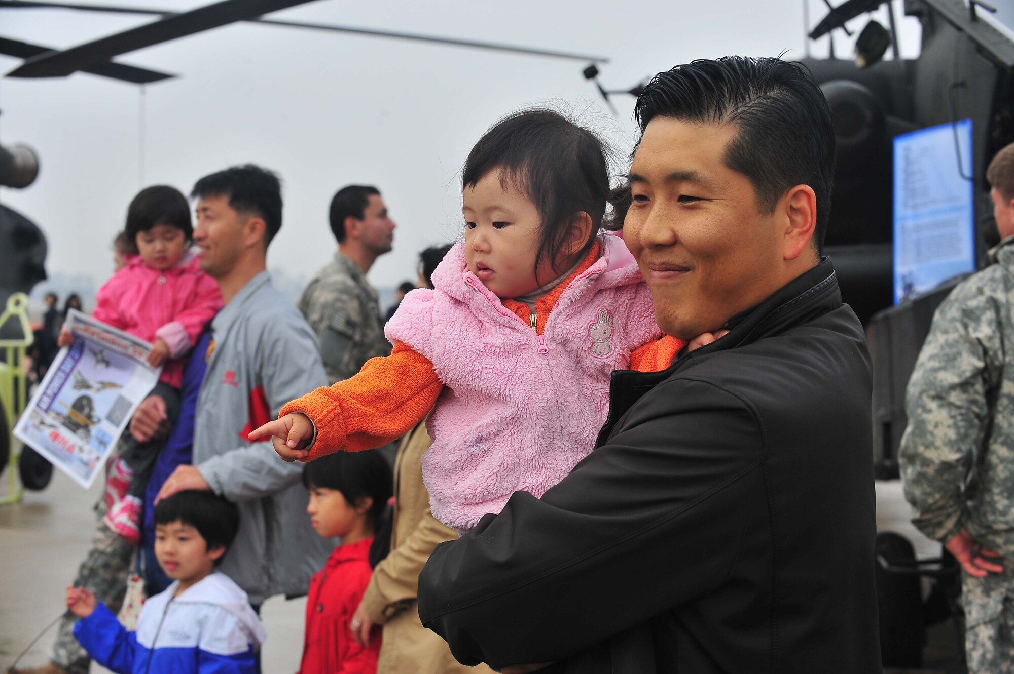 More than 50,000 service members and Korean spectators looked toward the sky and witnessed aerial acts, jumps and performances from across the globe, at Air Power Day 2011 here, Oct. 29 and 30.  (U.S. Air Force Photo by/Staff Sgt. Daylena Gonzalez)