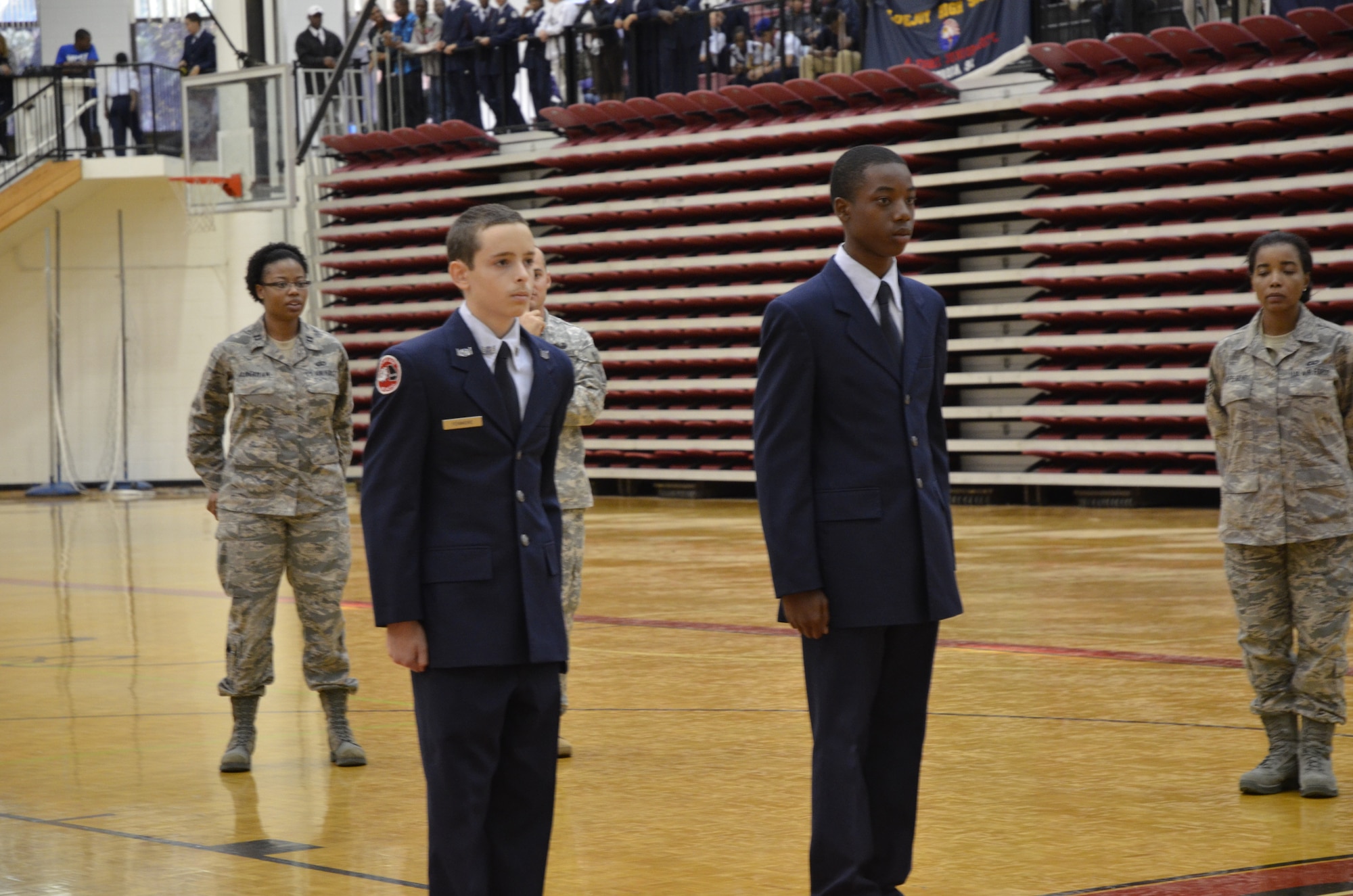 Several servicemembers, including Airmen from Dobbins, judge the final Air Force Junior Reserve Officer Training Corps competition at the Mt. Zion High School drill meet Nov. 29. The event was a "Simon-says" like game in which the JROTC cadets had to respond properly to a roll call of facing movements. (U.S. Air Force photo/ Senior Airman Danielle Campbell Purnell)