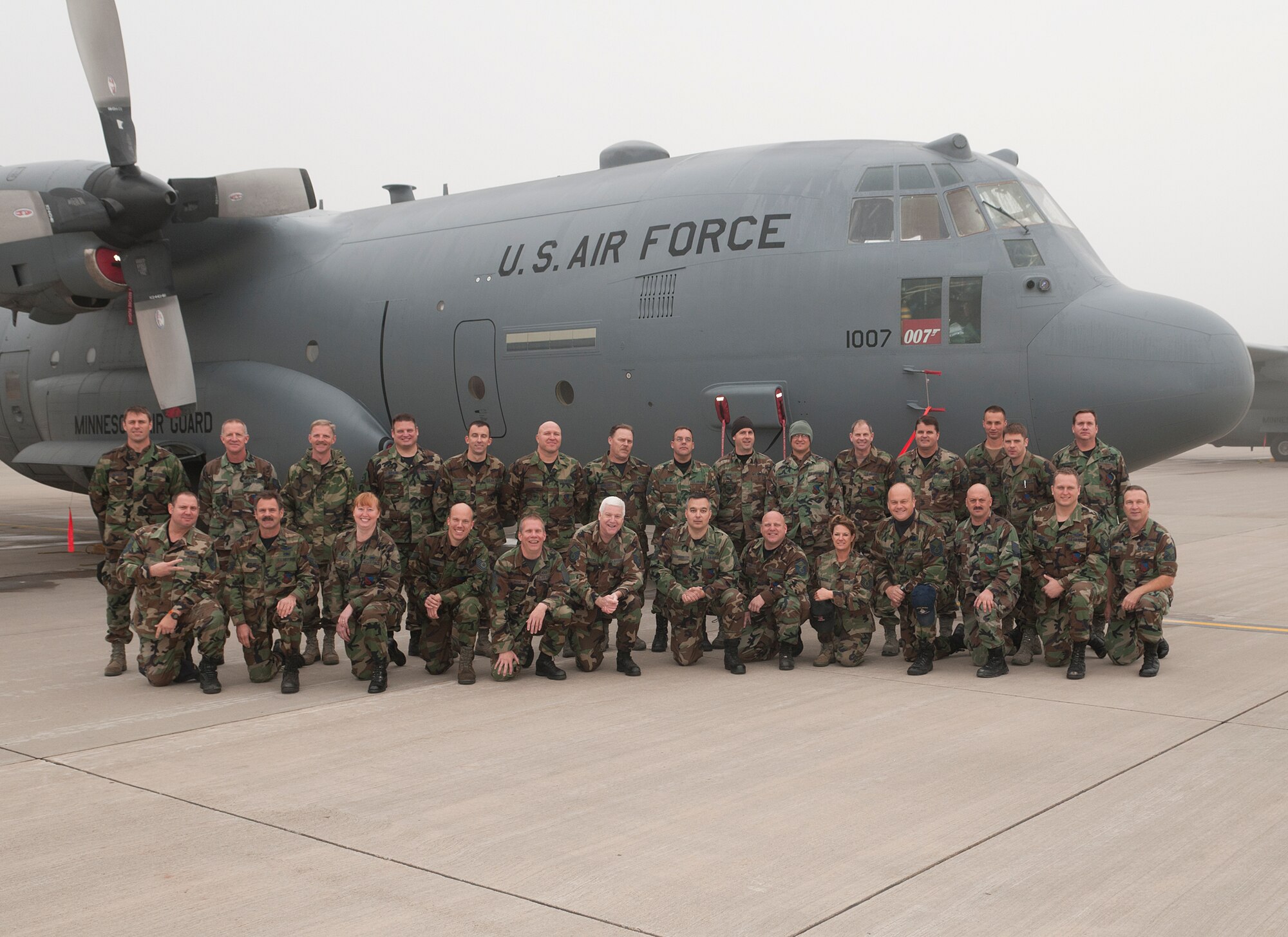 Dozens of Airmen at the 133rd Airlift Wing wore their old Battle Dress Uniform to work on Oct. 31, 2011, which is the last official day members of the Air Force and Air National Guard can wear it. About 30 Minnesotans from units all around the base paused to celebrate the moment in front of a C-130 H3 “Hercules” aircraft on the flightline of the air base on the Minneapolis – St. Paul international airport. USAF official photo by Master Sgt. Rick Crippen