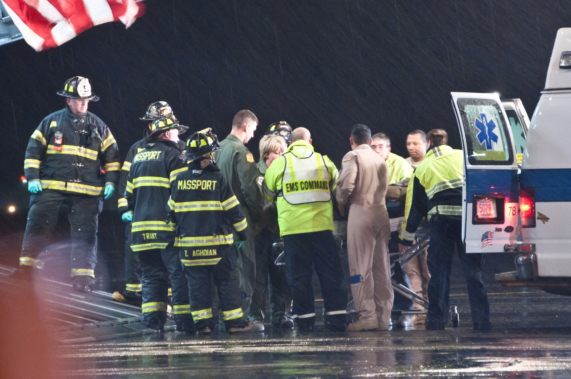 U.S. Air Force aeromedical evacuation crews, along with local emergency medical personnel, assist Libyan fighters off a C-17 Globemaster III at Boston Logan Airport, Mass., on Oct. 29, 2011. At the request of the Department of State and directed by the Secretary of Defense, the U.S. military is supporting U.S. and international medical assistance efforts in Libya. Specifically, the U.S. Air Force transported 22 wounded Libyans to Spaulding Rehabilitation Hospital in Salem, Mass. (U.S. Air Force Photo/Walter Santos)