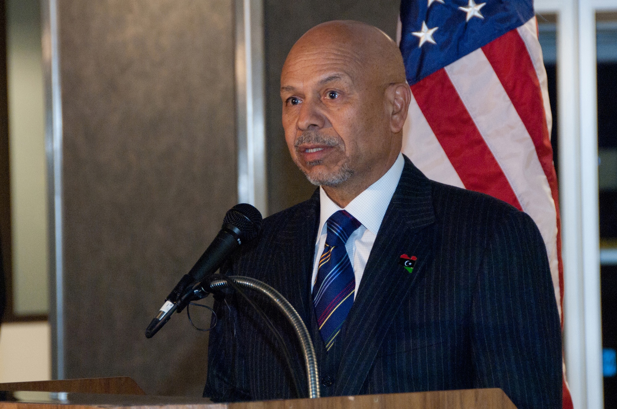 Ali Aujali, Libyan ambassador to the United States, expresses gratitude to America for supporting his country during war and peace before the arrival of 22 wounded Libyan fighters aboard a C-17 Globemaster III at Boston Logan Airport, Mass., on Oct. 29, 2011. At the request of the Department of State and directed by the Secretary of Defense, the U.S. military supported U.S. and international medical assistance efforts in Libya. Specifically, the U.S. Air Force transported 22 wounded Libyans to Spaulding Rehabilitation Hospital in Salem, Mass. (U.S. Air Force Photo/Walter Santos)