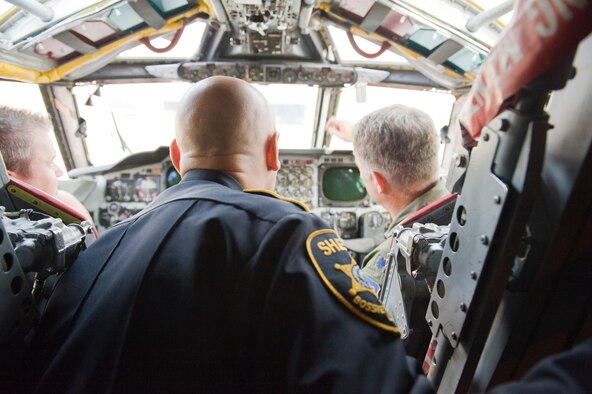 Members of the Bossier Sheriff and Police departments take a look inside the cockpit of a B-52H Stratofortress on the flight-line on Barksdale Air Force Base, La., Oct. 27. Fifteen members of the Bossier Sheriff and Police departments visited Barksdale to see day-to-day operations on base and visit Airmen from the 2nd Security Forces Squadron. (U.S. Air Force photo/Airman 1st Class Benjamin Gonsier)(RELEASED)