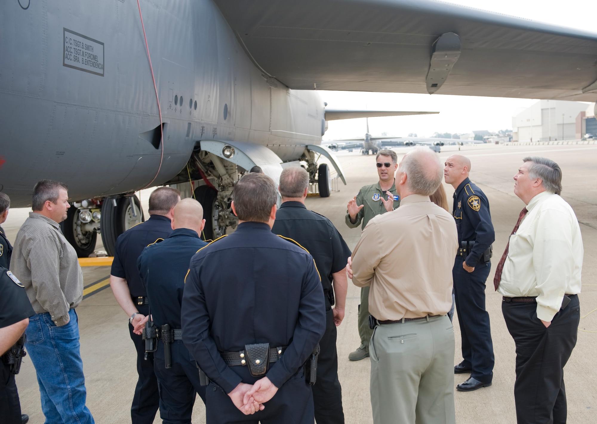 Members of the Bossier Sheriff and Police departments receive an aircraft brief near the B-52H Stratofortress on the flight-line on Barksdale Air Force Base, La., Oct. 27. Fifteen members of the Bossier Sheriff and Police departments visited Barksdale to see day-to-day operations on base and visit Airmen from the 2nd Security Forces Squadron. (U.S. Air Force photo/Airman 1st Class Benjamin Gonsier)(RELEASED)