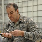 WRIGHT-PATTERSON AIR FORCE BASE, Ohio – Maj. Sean Handley, 445th Force Support Squadron, military personnel flight commander, reacts to tasting a spoonful of Voodoo Chili while judging the 445th Airlift Wing Chili Cook-Off Oct. 27. The event raised $250 for the Combined Federal Campaign. (U.S. Air Force photo/Stacy Vaughn)