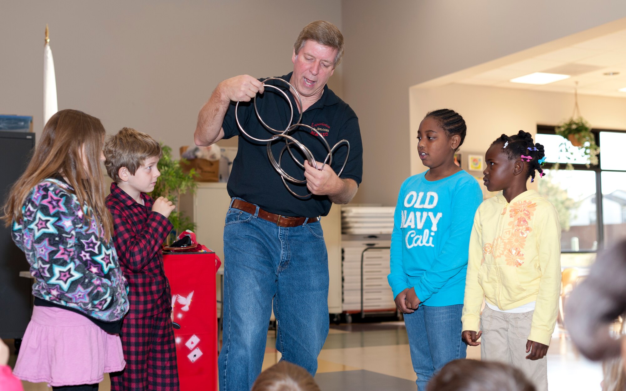 Jim Merrills, magician, performs in front of 26 school aged children on Oct. 28, 2011, McConnell Air Force Base, Kan.  Merrills engaged the children with his magic show while talking to them about staying drug free. (U.S. Air Force photo by Staff Sgt. Michael Schocker) 