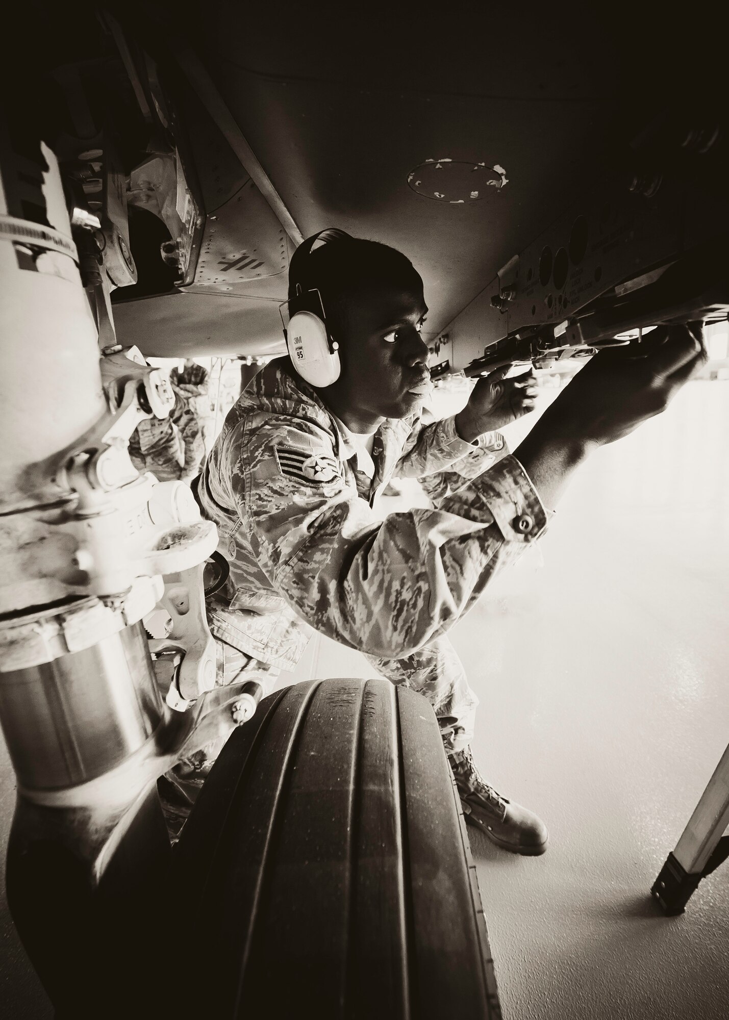 Staff Sgt. Anthony Childers, 46th Aircraft Maintenance Squadron crew leader, completes checks of his F-15 during the 46th Maintenance Group’s third quarter weapons load competition at Eglin Air Force Base, Fla., Oct. 28.  The best of the best from AMU Red and AMU Blue met to load a Joint Direct Attack Munition and an AIM-9 onto an F-15 and F-16 respectively.  AMU Red won with the best time and fewest errors.  (U.S. Air Force photo/Samuel King Jr.)