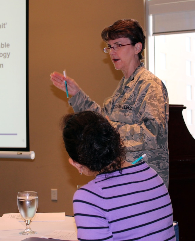 Col. Tracey Tenney, a surgeon general assigned to the Pentagon, briefs other surgeons during a conference in Panama City Beach, Fla., Oct. 25. First Air Force hosted the conference, which brought together SGs and deputy SGs from various Component Numbered Air Forces and gave them a chance to discuess issues and concerns within the SG career field. (U.S. Air Force photo by Angela Pope) 