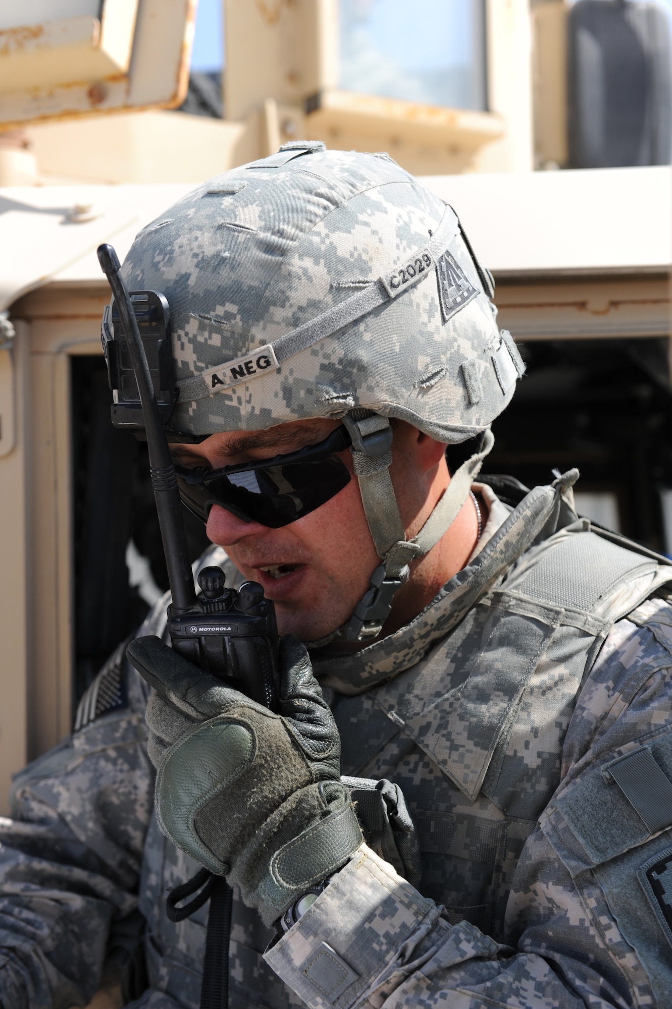 Army Staff Sgt. Brandon Combs, the NCO in charge of force protection for the 3rd Battalion, 4th Air Defense Artillery Regiment, calls in a report following an improvised explosive device incident during convoy training Oct. 28, 2011, at the 380th Air Expeditionary Wing. The Army unit requested this training from the 380th ESFS so their Soldiers could learn from Airmen with first-hand experience. The training covered threat response for things like improvised explosive devices and ambushers as well as wounded-Soldier evacuations and procedures for sending reports up to appropriate channels. (U.S. Air Force photo/Master Sgt. Chance Babin)