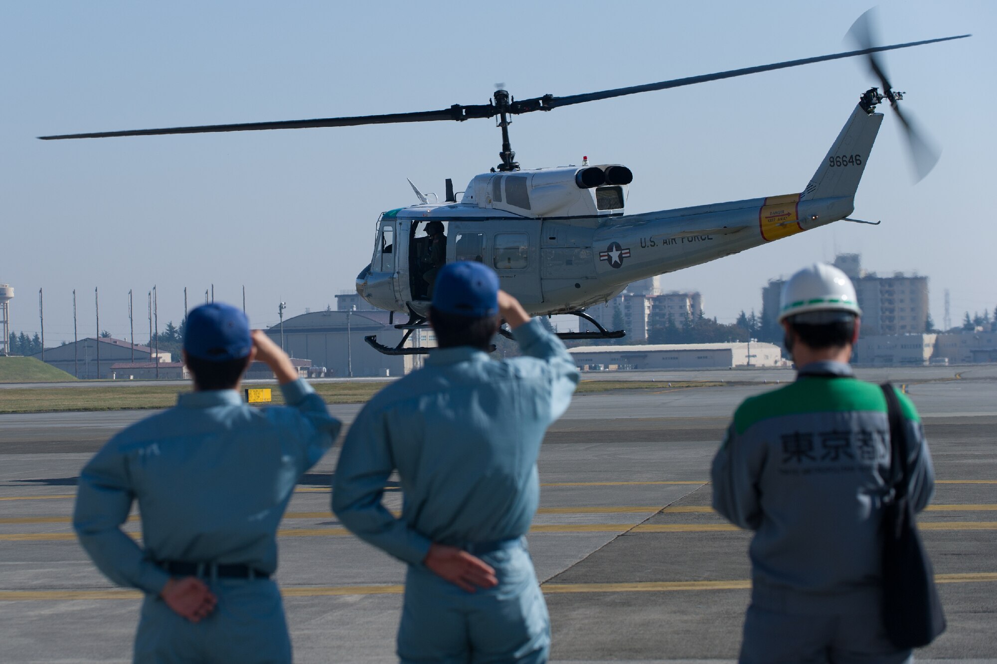 YOKOTA AIR BASE, Japan -- A UH-1N Huey takes off after loading  simulated relief supplies at Yokota Air Base, Japan, Oct. 29, 2011 during a Tokyo Metropolitan Government Comprehensive Disaster Prevention Drill. Yokota personnel practiced delivering simulated relief supplies to Koganei Park in downtown Tokyo. (U.S. Air Force photo/Osakabe Yasuo)