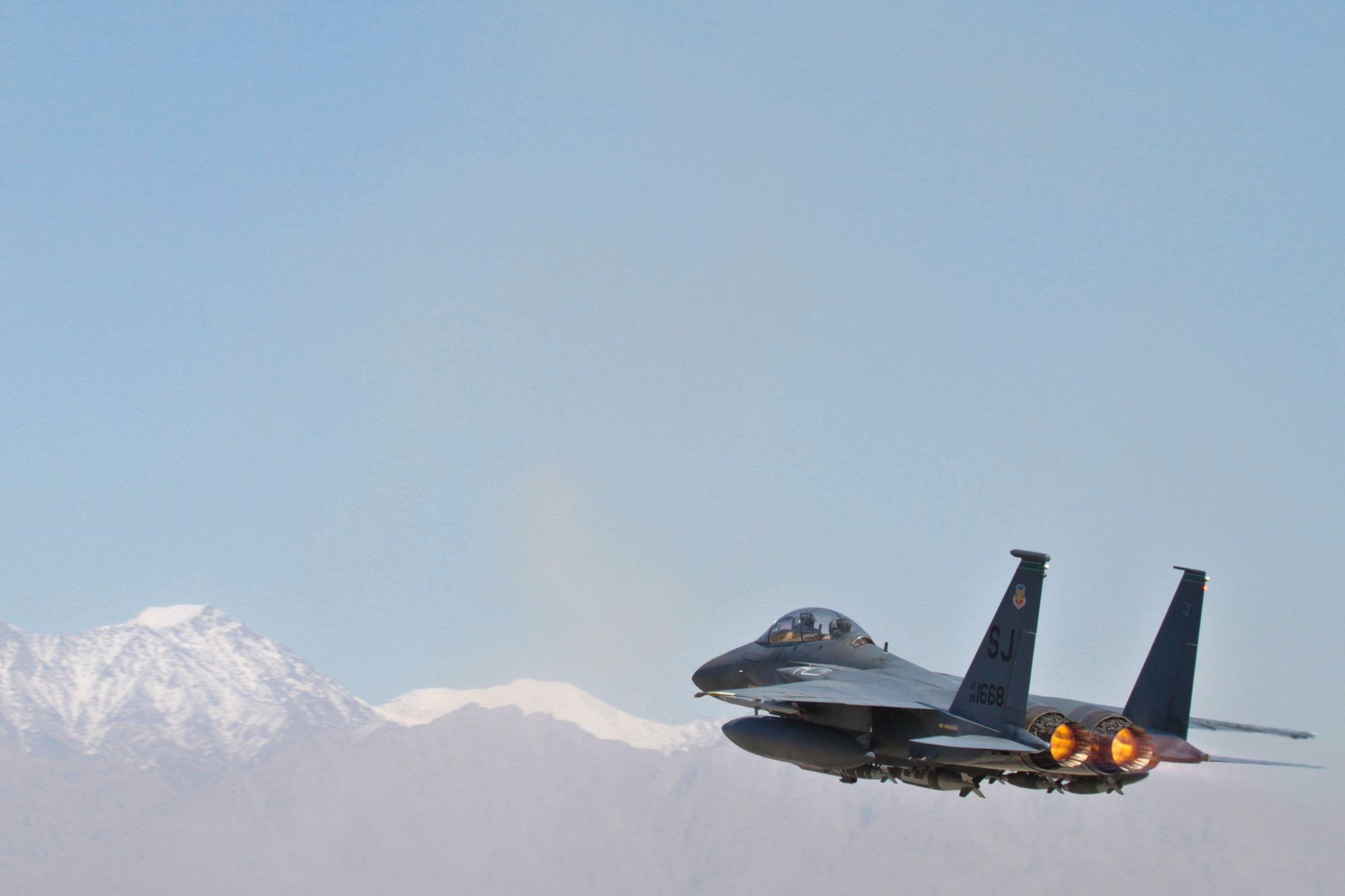 An F-15E Strike Eagle roars off into the Afghan sky Oct. 6. 2011. F-15s help provide residual base defense. Bagram Airfield is a joint installation, but its security is unusual in that defending the base is performed primarily by Airmen. Airmen from the 455th Air Expeditionary Wing are hard at work each and every day fulfilling the wing’s mission: “Support the fight, defend the base and win.” (U.S. Air Force photo/Tech Sgt. Matthew Hecht)