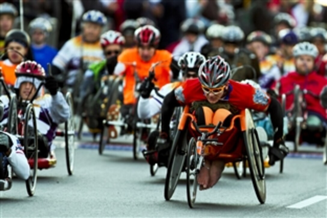 Participants in the 36th annual Marine Corps Marathon compete in the wheelchair category in Washington, D.C., Oct. 30, 2011.