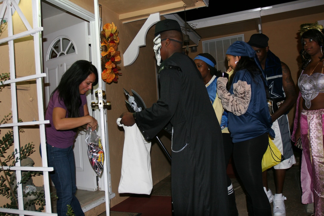 Marine Corps Recruit Depot San Diego's Single Marine Program hosted a trick-or-treating night Oct. 31 for anyone who wanted to dress up and go house-to-house for candy. The Marines made a stop in Old Town San Diego for dinner then made their way to houses in Old Town and Point Loma to get candy. Lance Cpl. Leandre Ingram, MCRD SMP president, arranged the event to give Marines that don't have family in the local area a way to celebrate Halloween safely.