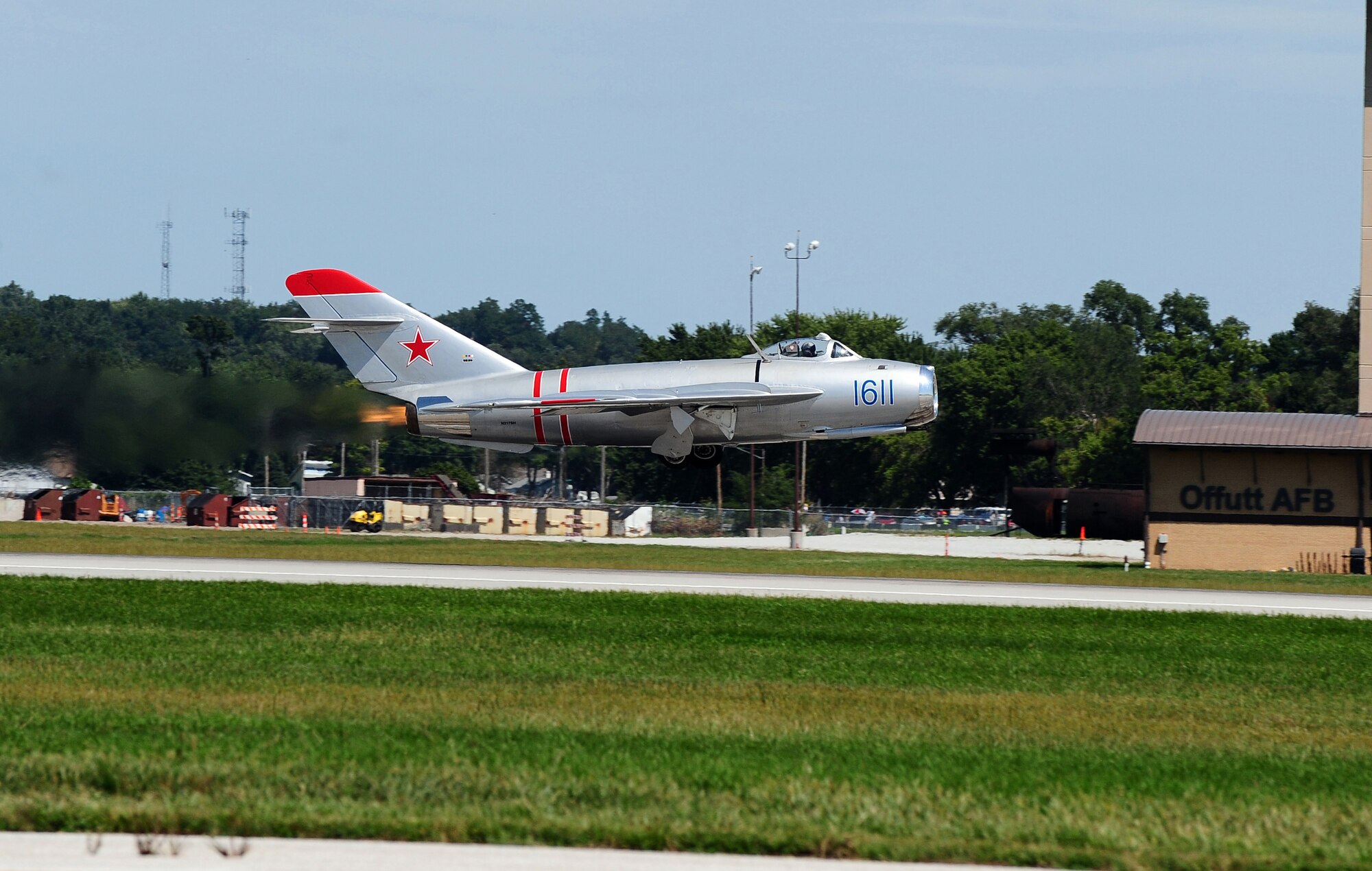 A Russian MiG-17 jets down the Offutt Air Force Base runway during the 2011 Defenders of Freedom Open House and Air Show Aug. 27.  Thousands of people attended the air show for a chance to see and hear aircraft perform. (U.S. Air Force photo by Josh Plueger)