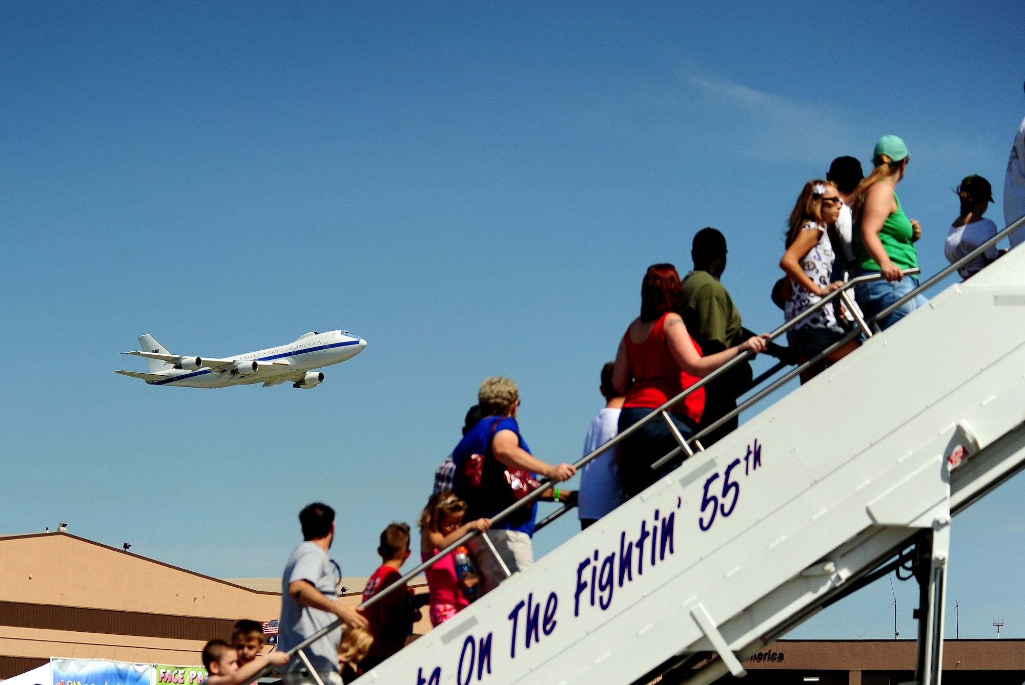 Air show attendees at the 2011 Defenders of Freedom Air Show and Open House, were treated to a flyby of an E-4B as it flew along Offutt Air Force Base's runway Aug. 27. The E-4B airframe is specially modified to serve as a survivable mobile command post for the president of the United States, secretary of defense and their successors. (U.S. Air Force photo by Josh Plueger)