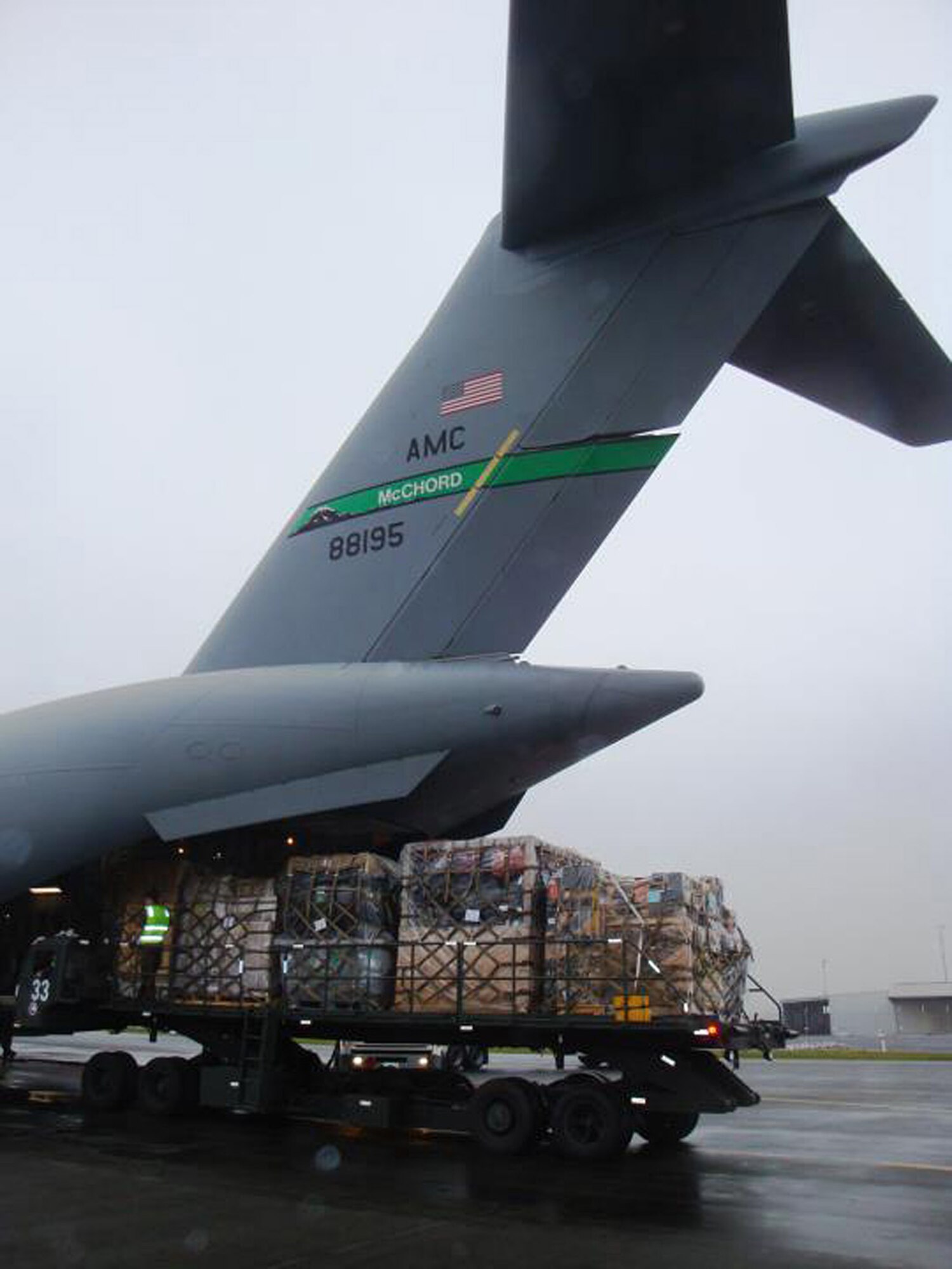 CHRISTCHURCH, New Zealand - Cargo is loaded on a C-17 from Joint Base Lewis-McChord, Wash., in preparation for the first flight of the season for Operation Deep Freeze 2011-2012.  Crews of Reserve and active-duty Airmen from the 446th and 62nd Airlift Wings plan to fly 72 missions this season, 10 more than last year. (Courtesy photo)