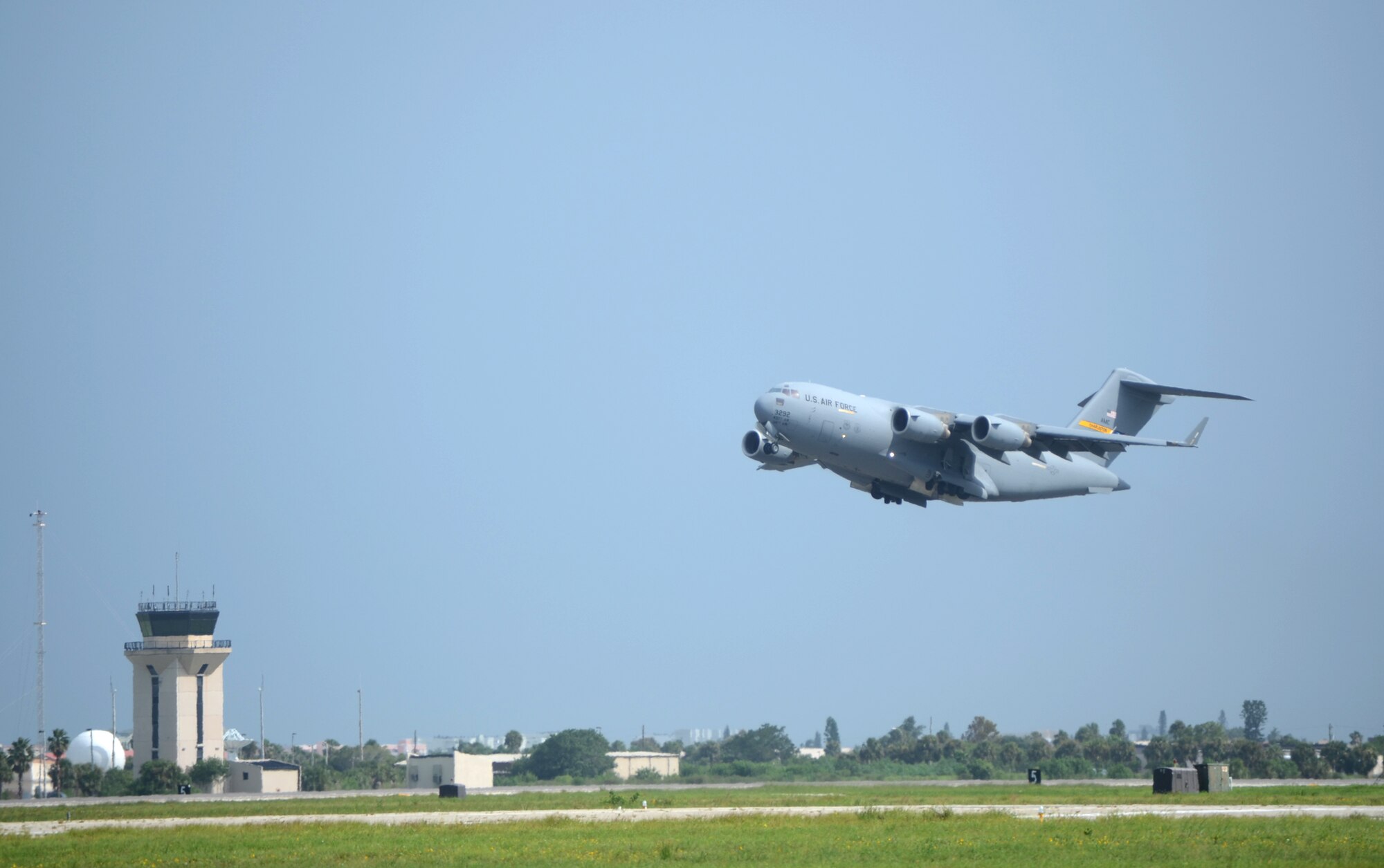 PATRICK AIR FORCE BASE, Fla.- A C-17 Globemaster III cargo aircraft takes off from the runway here for Afghanistan carrying a dozen pararescuemen and their gear. The Air Force Reservists are from the 920th Rescue Wing. They will perform life-saving missions. The wing's other peacetime missions include providing local search-and-rescue support for civilians who are lost at sea or in distress. (U.S. Air Force photo/Airman 1st Class Natasha Dowridge)
