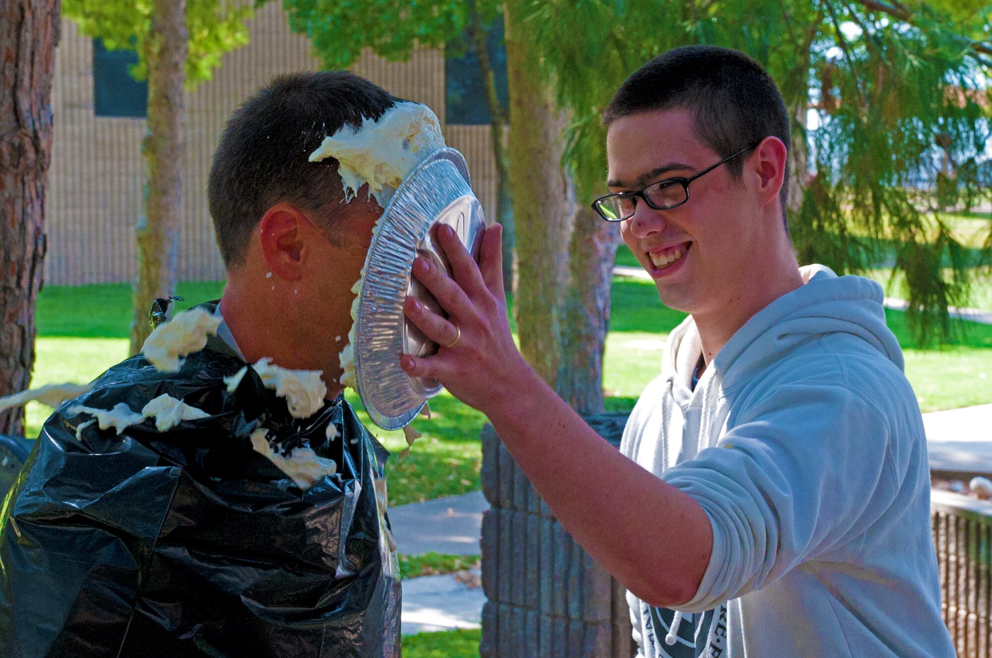 LAUGHLIN AIR FORCE BASE, Texas – Col. Thomas Murphy, 47th Flying Training Wing vice commander, get’s pied here Aug. 26. Laughlin’s Rising Six hosted a pie-in-the-face contest to raise more than $1,300 that will go towards the upcoming combat dining out. (U.S. Air Force photo/Senior Airman Scott Saldukas) 