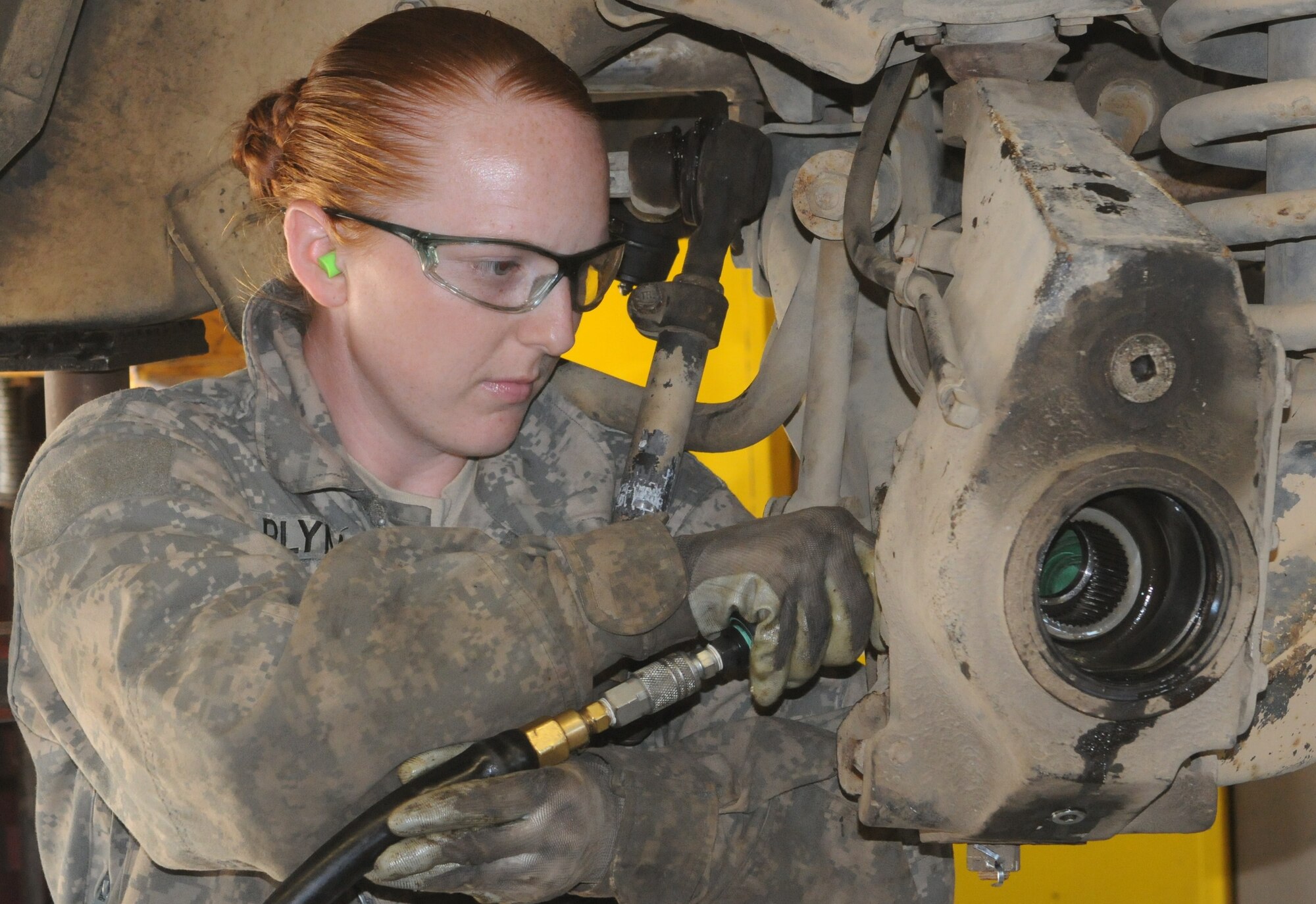 Sgt. Ashley Plymale, an Alabama native, works as a wheeled vehicle mechanic for the 322nd Logistical Support Battalion at Joint Base McGuire Dix Lakehurst. Plymale joined the Army in response to 9/11 and now lives in New York City. (U.S. Army photo by Sgt. Peter C. Jun/Released)