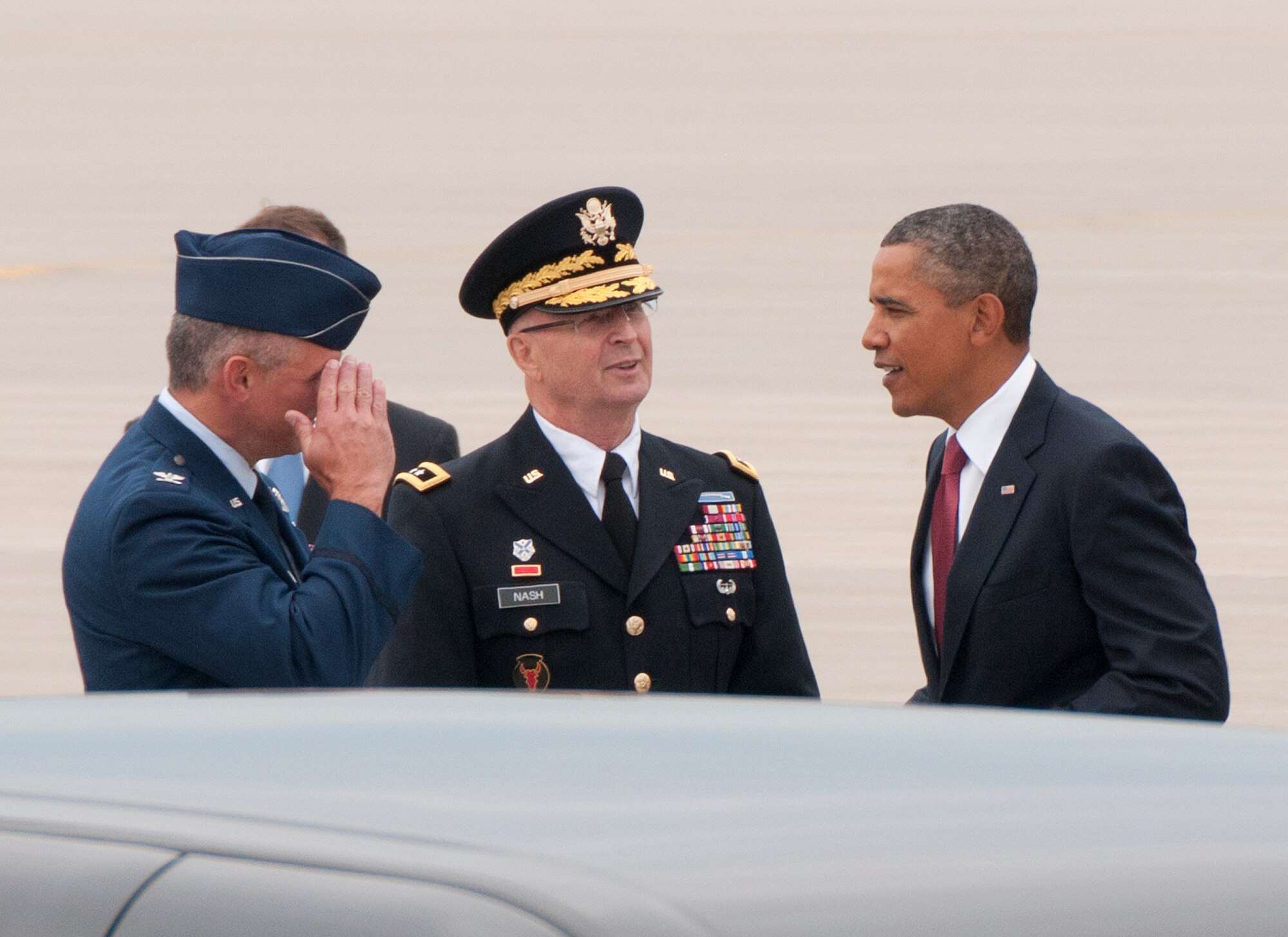 The commander-in-chief, President Barack Obama, is greeted as he steps off Air Force One by Maj. Gen Rick Nash, Minnesota’s Adjutant General (center) and Col. Greg Haase, commander of the 133rd Airlift Wing on the ramp of the 133rd Airlift Wing at the Minneapolis-St. Paul International Airport on August 30, 2011. The president is in the Twin Cities where he delivered a speech to the American Legion Annual Conference. The visit is heavily supported with security, logistics, media and other support by the Airmen of the 133rd Airlift Wing. USAF official photo by Senior Master Sgt. Mark Moss