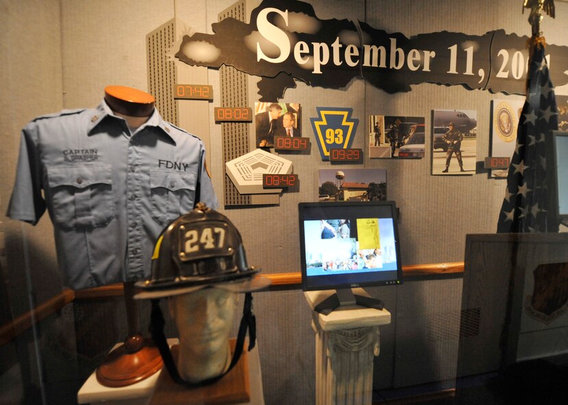 A display at the Eighth Air Force museum on Barksdale Air Force Base, La., pays respect to the first responders who lost their lives on 9/11. President George W. Bush stopped here on the morning of the attacks to address the American people. (U.S. Air Force photo/Senior Airman Chad Warren)(RELEASED)