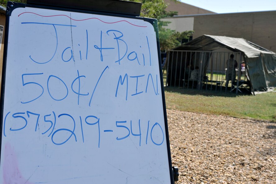 A sign advertises the Jail and Bail outside the fitness center at Cannon Air Force Base, N.M., Aug. 31, 2011. The Jail and Bail is a yearly fundraiser held by the 27th Special Operations Security Forces Squadron booster club during which Air Force members can be arrested and held in a mock jail for the price of 50 cents per minute. (U.S. Air Force photo by Airman 1st Class Ericka Engblom)