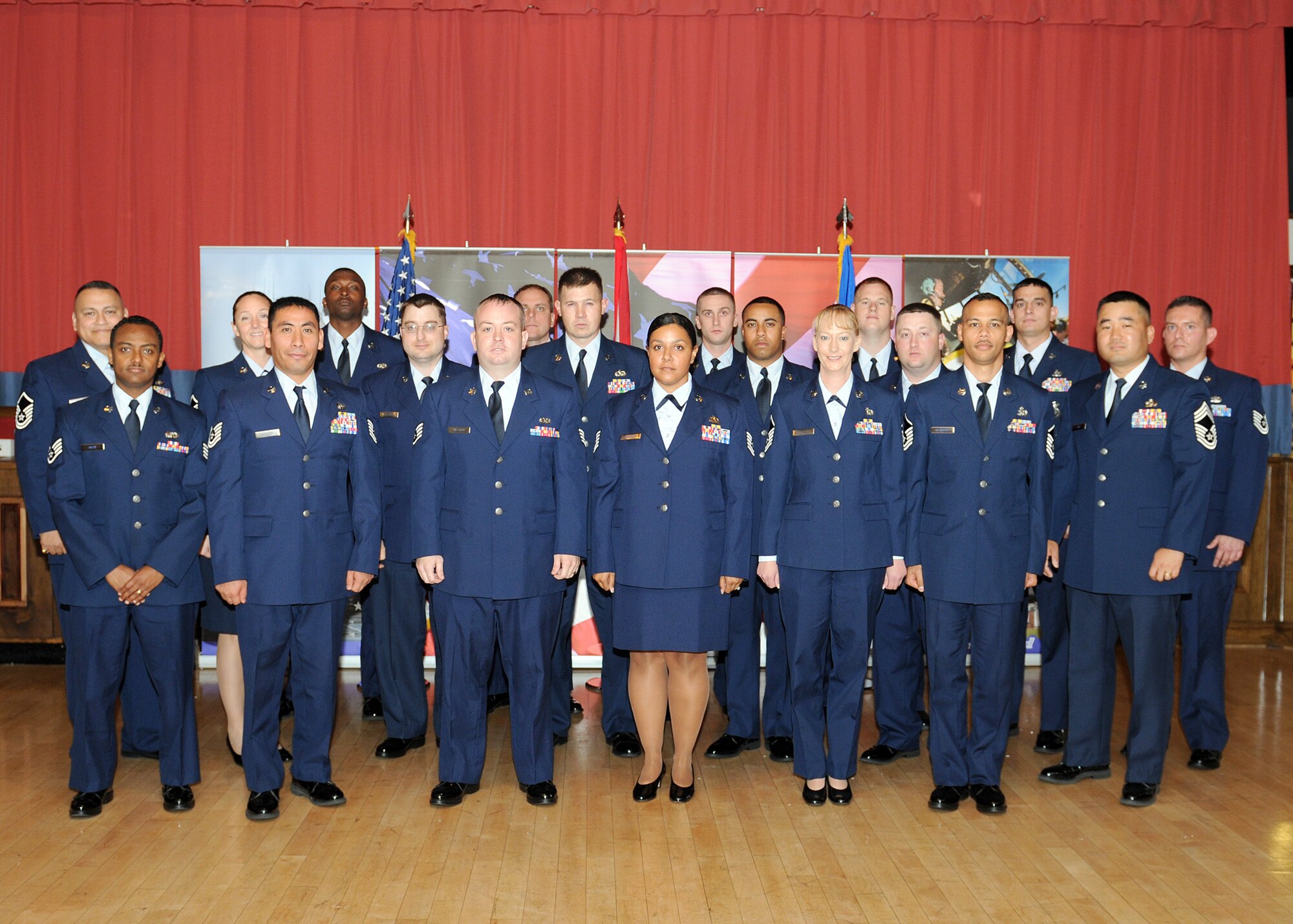 RAF MILDENHALL, England – Some of Team Mildenhall’s newest promotees attend a promotion ceremony here Aug. 31, 2011.  The Team Mildenhall Promotion Ceremony is held monthly, and units are encouraged to attend to recognize their Airmen for advancing to the next level of responsibility in their Air Force careers. (U.S. Air Force photo/Staff Sgt. Tabitha M. Lee)