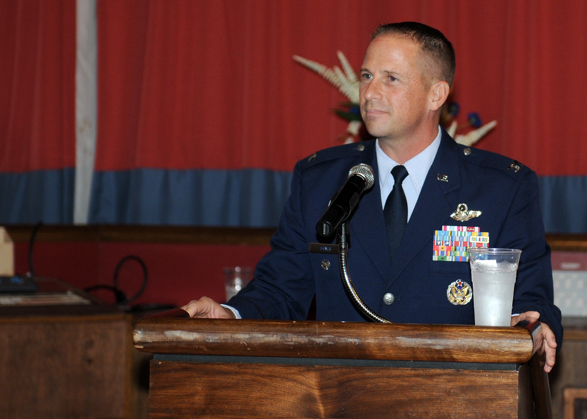 RAF MILDENHALL, England -- Col. Kyle Voigt, 100th Air Refueling Wing vice commander, congratulates Team Mildenhall’s newest promotees during the monthly promotion ceremony here Aug. 31, 2011.  About 50 people are promoted at RAF Mildenhall each month.  (U.S. Air Force photo/Staff Sgt. Tabitha M. Lee)