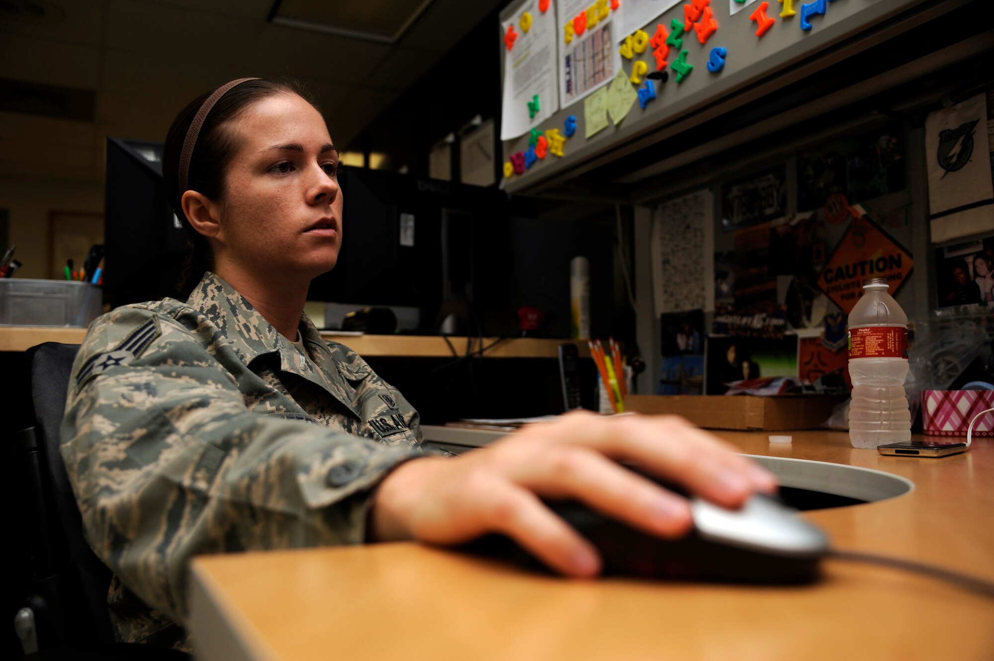 WHITEMAN AIR FORCE BASE, Mo.- Senior Airman Alanna McCafferty, 509th Medical Support Squadron medical maintenance technician, checks the maintenance scheduled for her workday, Aug. 26. Medical maintenance has the crucial job of ensuring all medical machinery is serviceable, so the base clinic here can safely treat its monthly average of 5,000 patients.  (U.S. Air Force photo/Senior Airman Cody H. Ramirez)