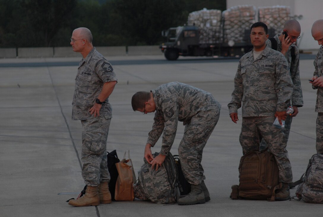 Members of the 263rd Combat Communications Squadron, located in New London, N.C. deployed to Southwest Asia August 29.  Part of the North Carolina ANG’s 145th Airlift Wing, based in Charlotte, N.C., the group departed from Charlotte ANG Base on a C-5 Galaxy aircraft with supplies to assist in the creation of base infrastructure at an undisclosed location.  Photos here depict the loading and boarding processes prior to departure.