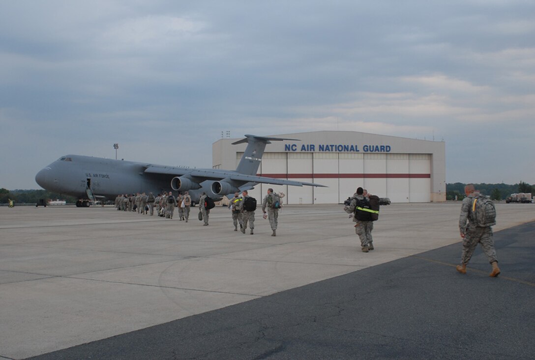 Members of the 263rd Combat Communications Squadron, located in New London, N.C. deployed to Southwest Asia August 29.  Part of the North Carolina ANG’s 145th Airlift Wing, based in Charlotte, N.C., the group departed from Charlotte ANG Base on a C-5 Galaxy aircraft with supplies to assist in the creation of base infrastructure at an undisclosed location.  Photos here depict the loading and boarding processes prior to departure.