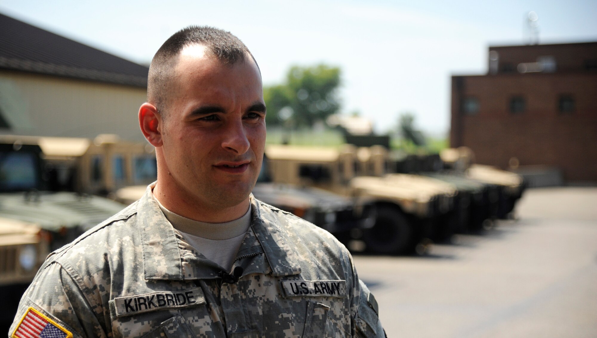 WHITEMAN AIR FORCE BASE, Mo. - Army Sergeant Stephen Kirkbride, Missouri National Guard, 1-135th Aviation Reconnaissance Battalion, answers questions during an interview here, Aug. 22. Kirkbride broke the 2011 Missouri State Fair Amateur Dead-lift Competition with a 550-pound lift, shattering the previous record of 515 pounds. (U.S. Air Force photo/Senior Airman Cody H. Ramirez)