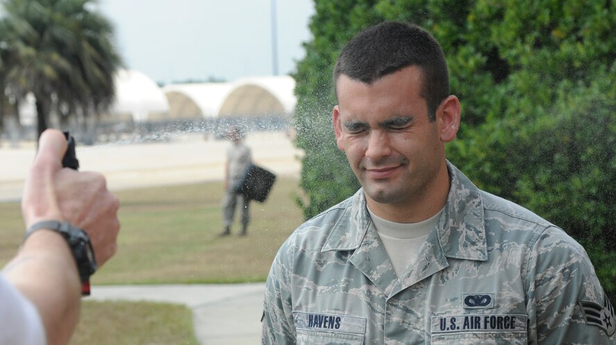 U.S. Air Force Senior Airman Jesse Havens, 23rd Security Force Squadron (SFS) patrol leader, gets sprayed with oleoresin capsicum spray for training at Moody Air Force Base, Ga., Aug. 31, 2011. Every security forces Airmen participated in this inaugural Moody training. U.S. Air Force photo by Airman 1st Class Paul Francis/Released)