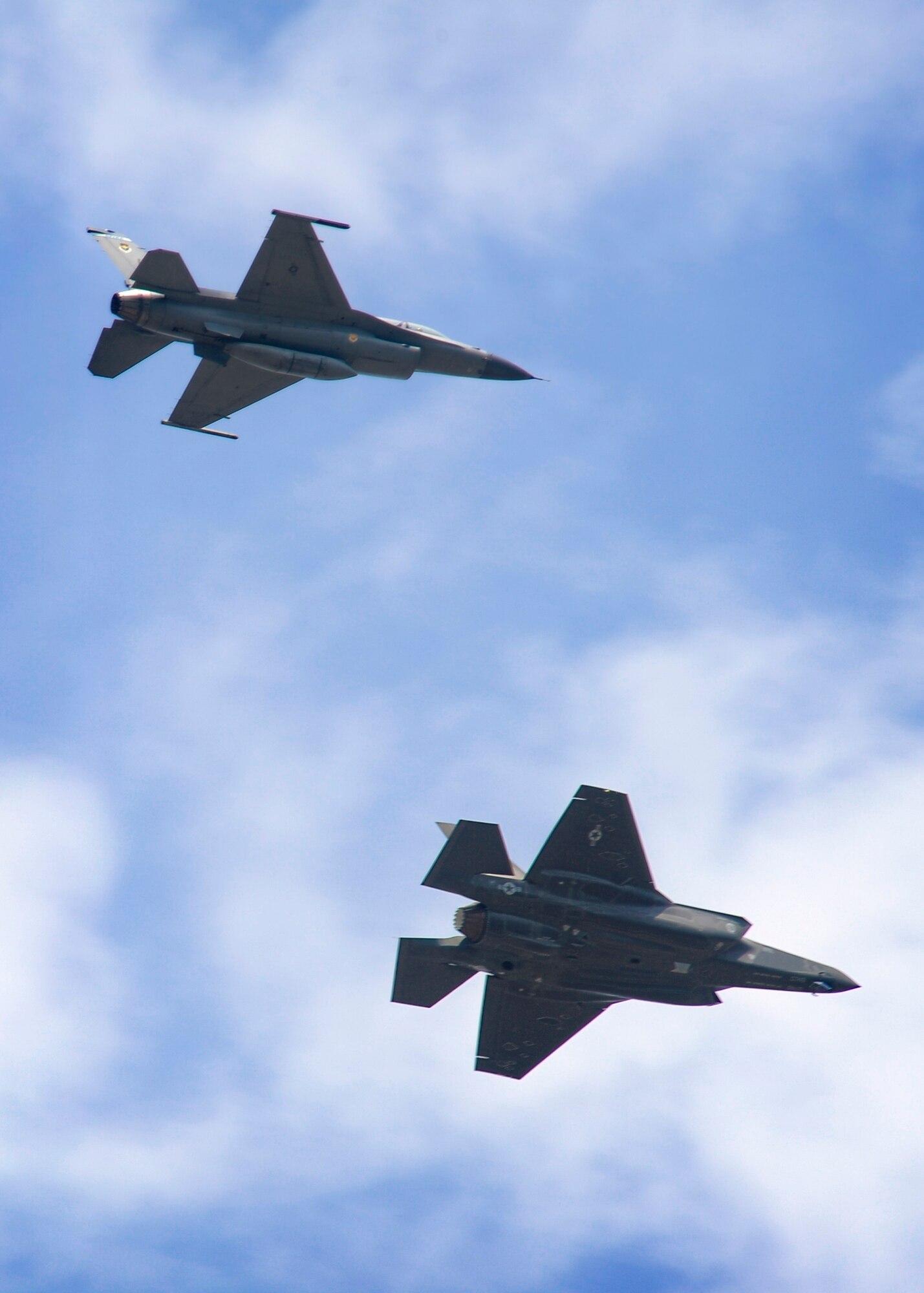 Another F-35A Lightning II joint strike fighter arrived at Eglin with a 33rd Fighter Wing piloted F-16 escorting the jet to their new home Aug. 31.  It was one of two aircraft  delivered to Eglin that day by Lockheed Martin, bringing the total count of the fifth generation fighter aircraft here to four. The jets here are used for JSF maintenance training until all certifications are complete. More F-35s are scheduled to arrive at Eglin this year, including at least one short takeoff/vertical landing (STOVL) variant, BF-6. (U.S. Air Force photo/Staff Sgt. Joely Santiago)