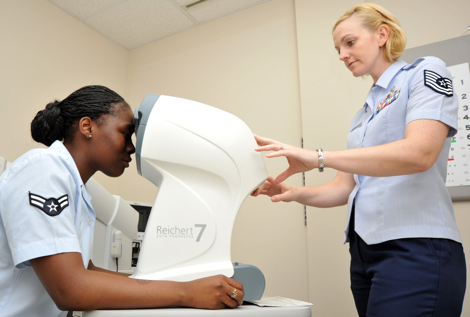 Tech. Sgt. Mary Nelson, 22nd Aeromedical Squadron Optometry Clinic NCO in charge, measures pupillary distance for an eyeglass fitting for Airman 1st Class La’Gail Douglas, 22nd AMDS optometry technician.  As the NCOIC of Optometry Clinic, Nelson manages day-to-day operations of the clinic including ophthalmic programs, schedules, supplies and equipment duties.  (U.S. Air Force photo/Senior Airman Abigail Klein)
