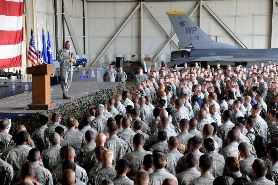 KUNSAN AIR BASE, Republic of Korea -- Gen. Gary L. North, Pacific Air Forces commander, holds an all call with the members of the 8th Fighter Wing here Aug. 22.  During his visit, the general toured facilities and spoke to Wolf Pack members to reiterate their importance and roles.  (U.S. Air Force photo/Staff Sgt. Rasheen Douglas)